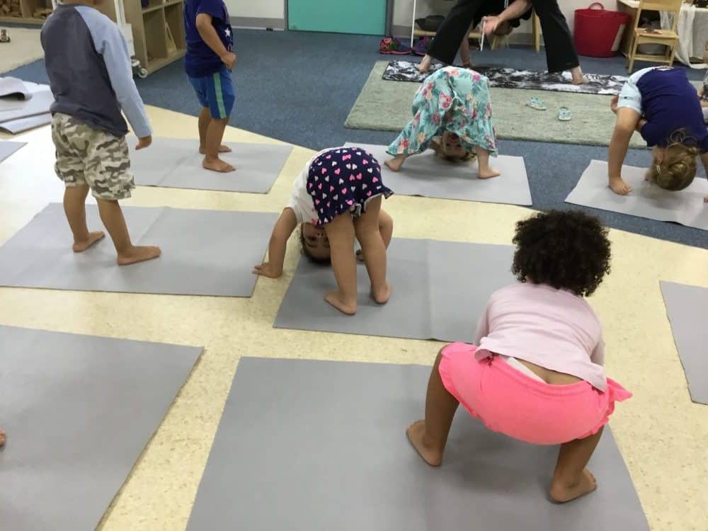 children stretching in yoga classes