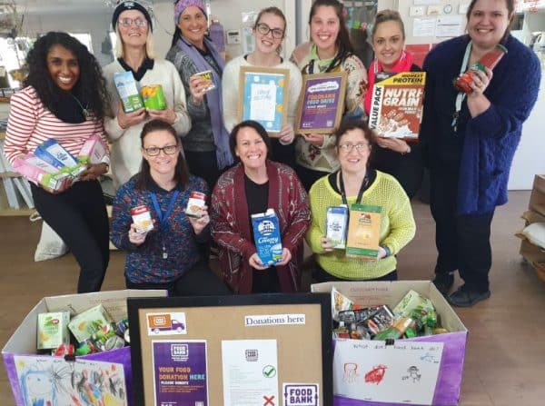 Group of Educators at childcare centre collecting food for foodbank