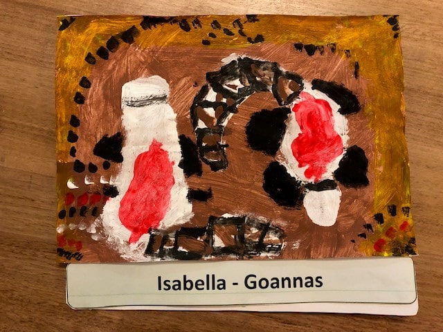 two goannas painted by child using traditional Indigenous techniques