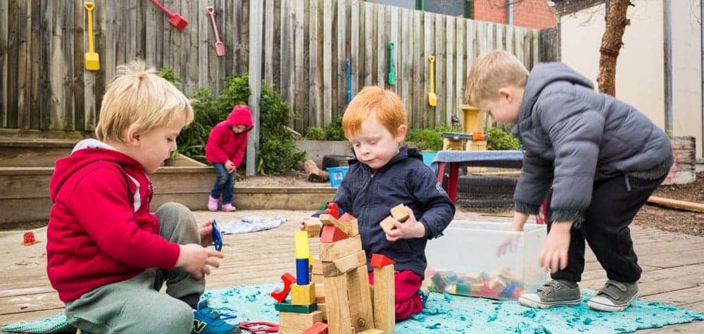 children playing outside at family afternoon tea @ Guardian Mentone