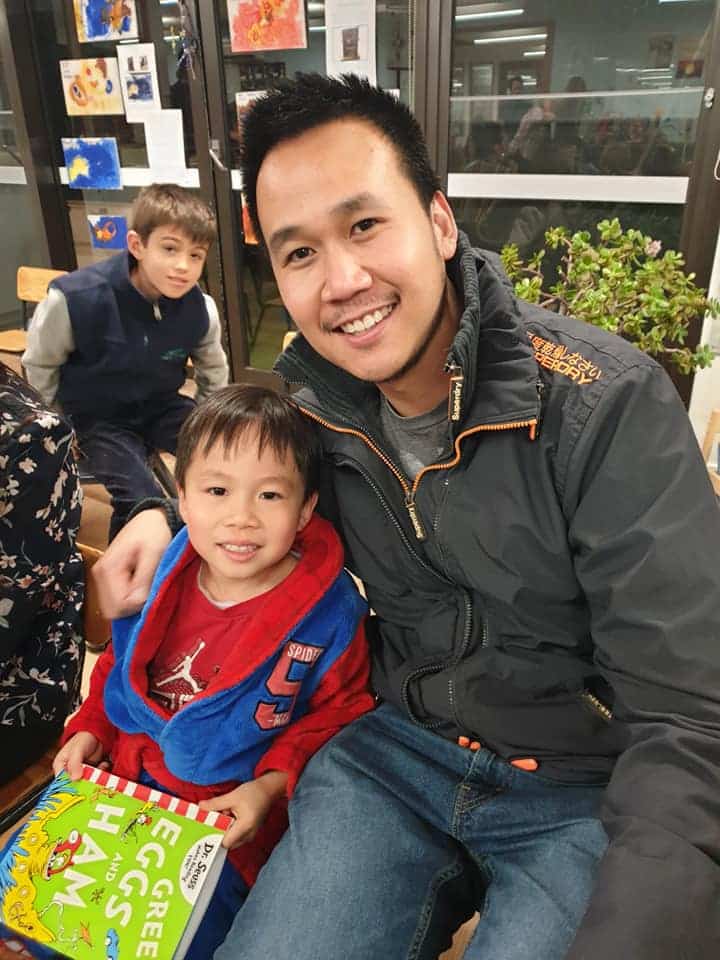 father and son at story night for book week