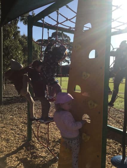 children playing on playground on an excursion