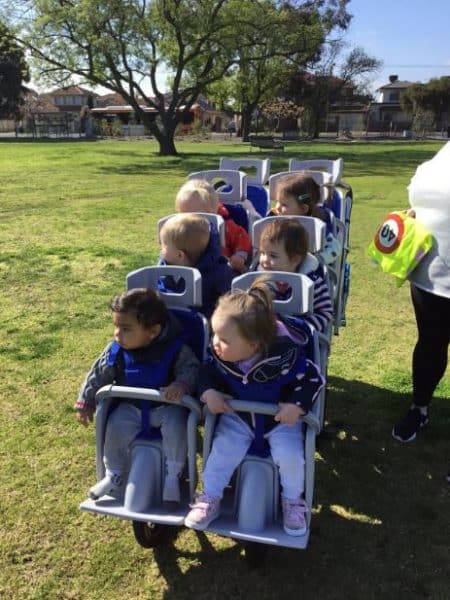 babies in Octo-Pram on excursion to local park