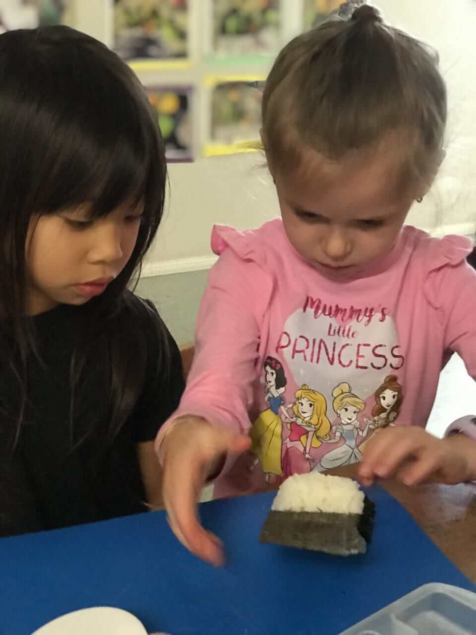 children making sushi