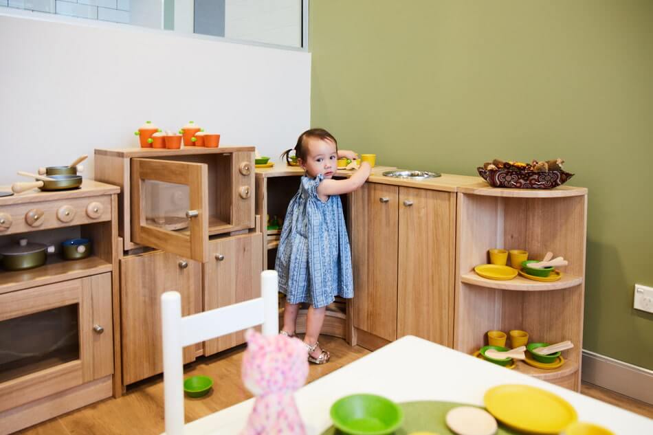 child cooking at childcare centre