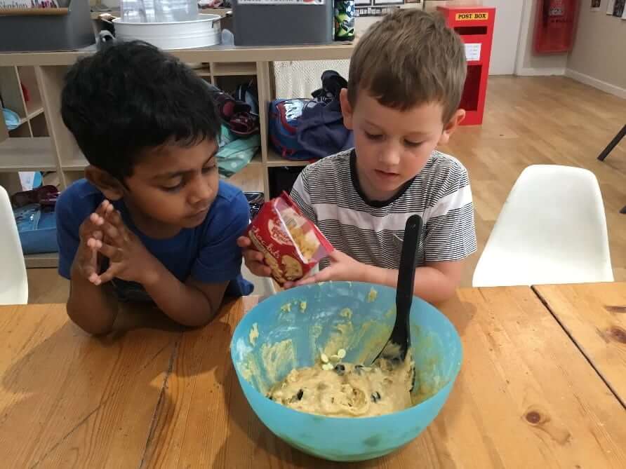 children making cookies for local fire brigade