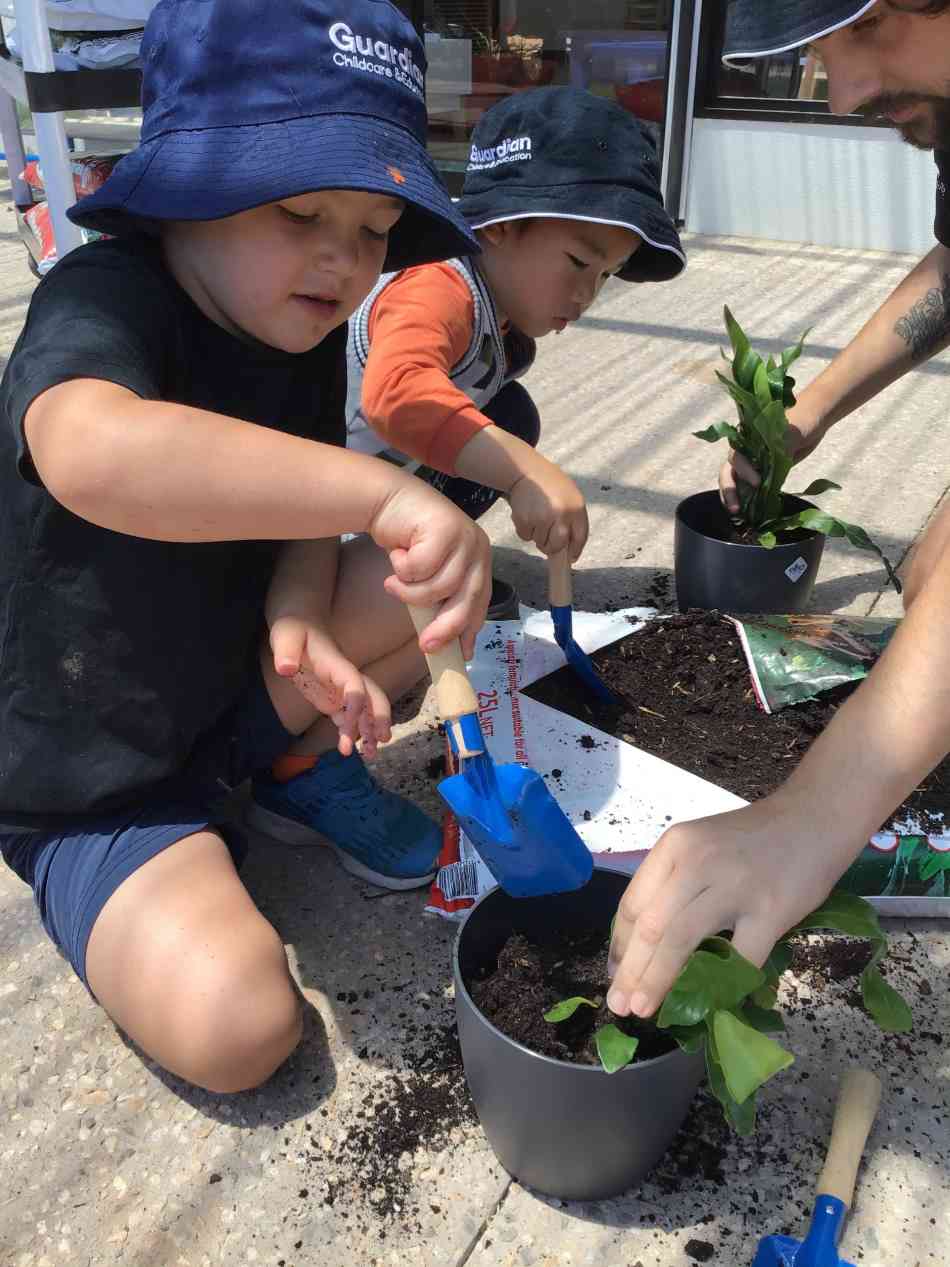 children pot plants for Guardian centre