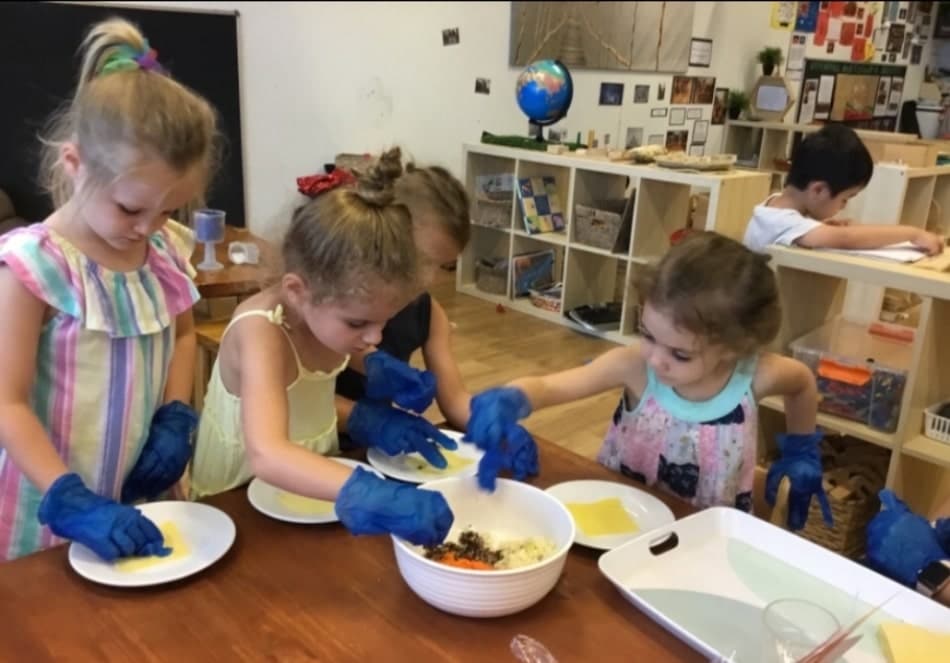 children making dumplings during Chinese New Year celebration