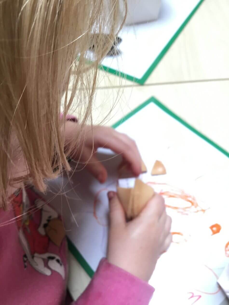 child opening fortune cookie