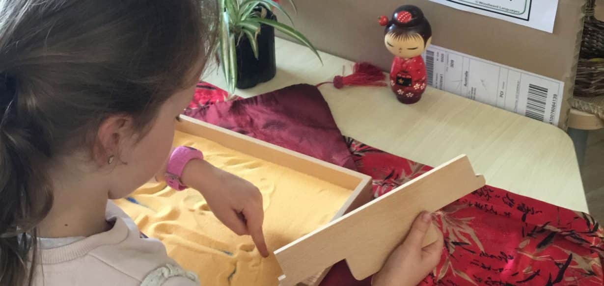 child learning about Chinese numbers for Chinese New Year