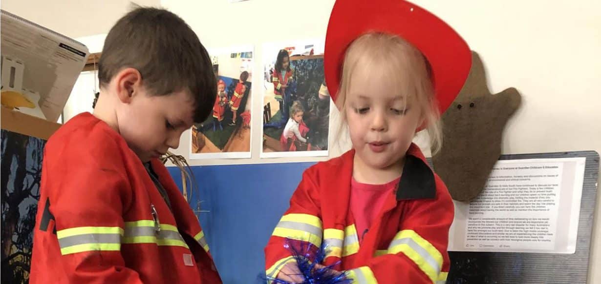 children using role play to explore bushfires and firefighters