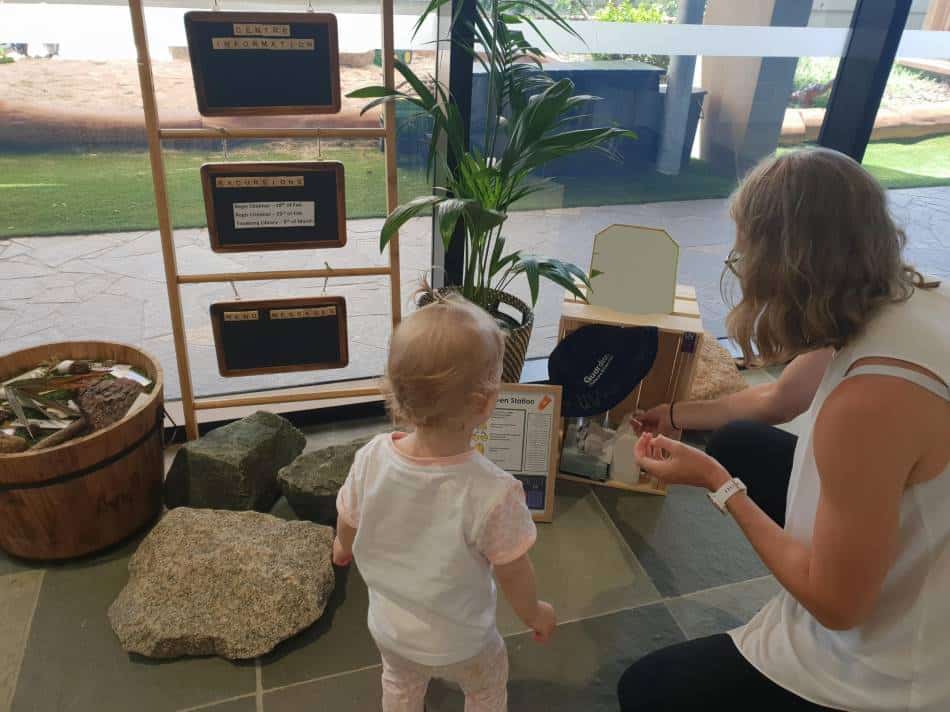 mother and child at sunscreen station, one of Taringa's parents spaces