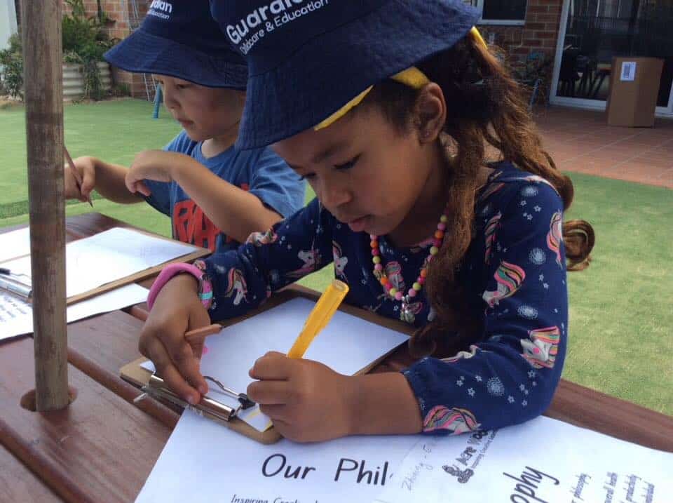 child making notes on Centre philosophy