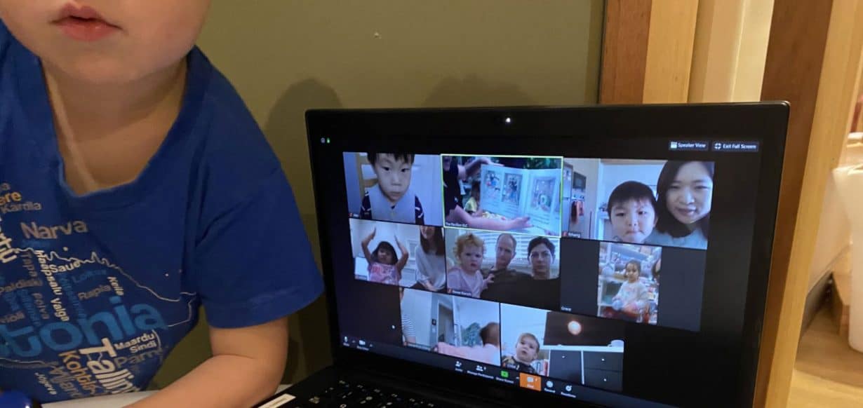 Child connecting with friends at home via Zoom