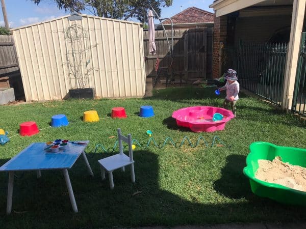 child completing obstacle course as part of backyard kinder program