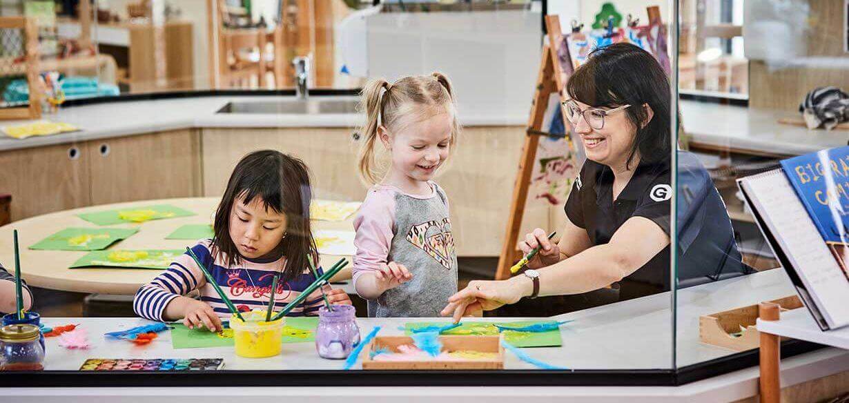 Children and educator playing with art at Guardian Coromandel Valley