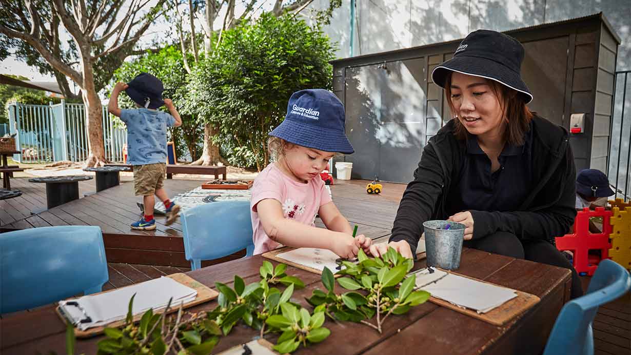 Child and Educator interacting outdoor at Pymble