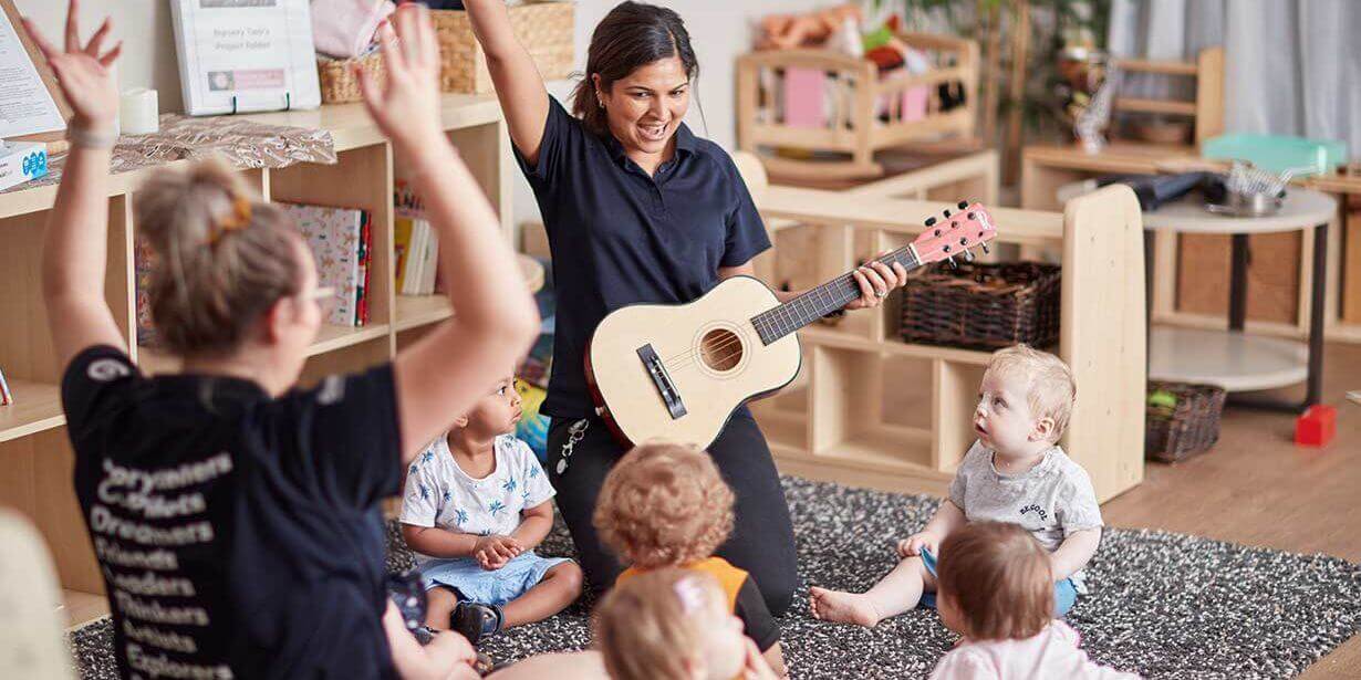 Children and educators playing instruments