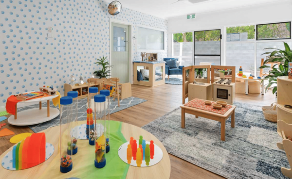 Bright and engaging play area at Guardian Childcare Bellbowrie, Queensland, featuring sensory play, kitchen and reading zones.