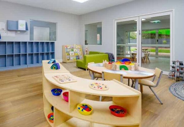Inside Guardian Childcare Howlong NSW: A bright and inviting early learning room featuring child-sized furniture, educational toys, and natural light, creating a stimulating environment for children's development.
