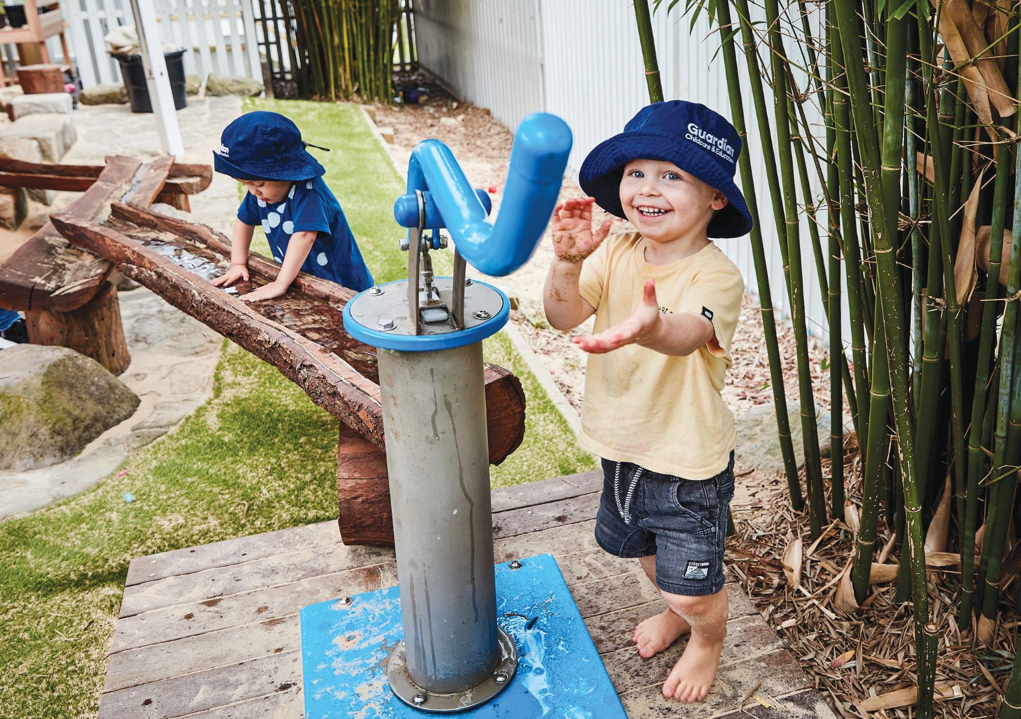 Child playing outdoors at Guardian Childcare centre